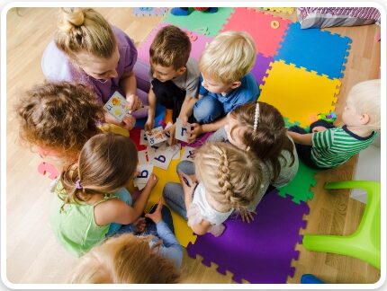 Kids playing in school with literacy learning games